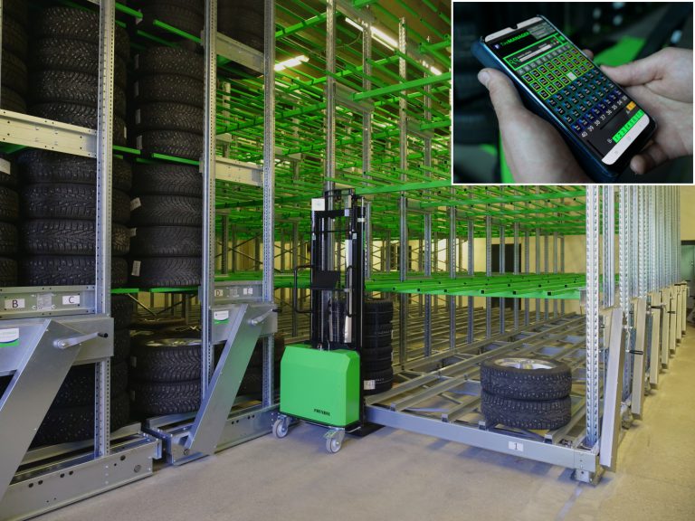 A tire stacker in a tire warehouse and a picture of hands holding a mobile phone on the top right corner.