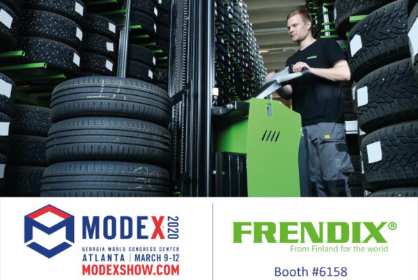 A man with a tire stacker in a tire warehouse and information about 2020 Modex fair in Atlanta.