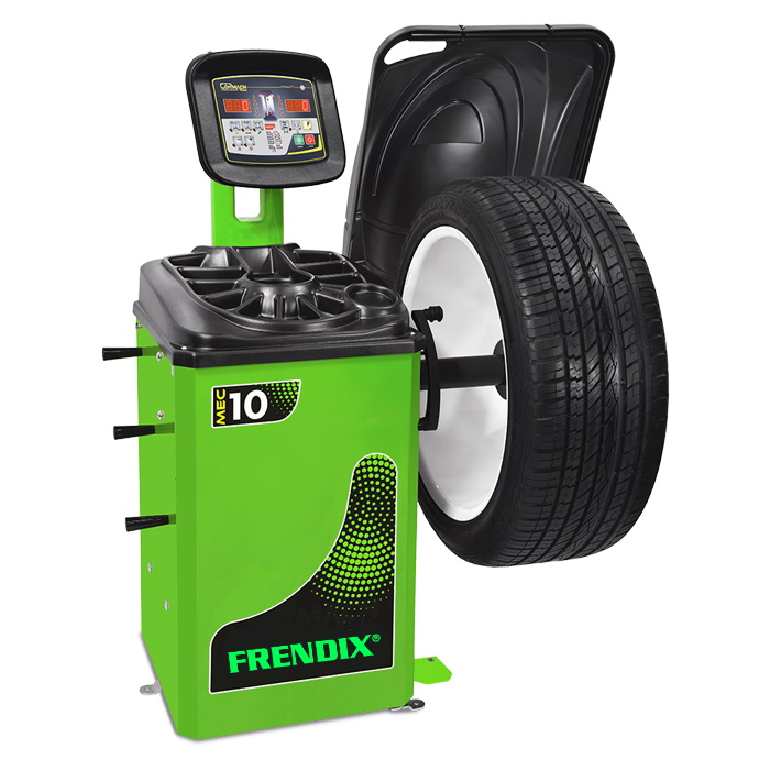 A green tire balancing machine.